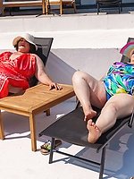 Busty gilf getting pussy licked by younger babe poolside