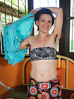 Playful brunette stripping slow and showing her hairy charm