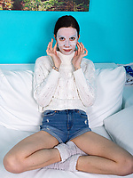 Cute inked babe spreads open to show her thick juicy bush