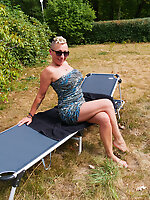 Outdoor posing from an edgy older lady with a mohawk