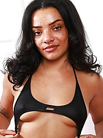 Sexy ebony babe in black bikini spreading hairy bush