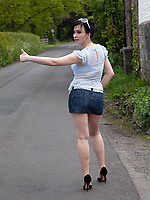 Horny babe flashing hairy bush on chair teasing