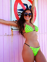 Woman is in a mood to flash big tits and hairy pussy on the beach