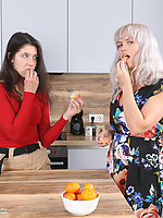 Two playful hairy women enjoy pussy licking in the kitchen