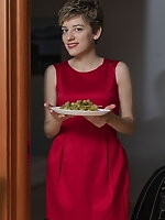 Short-haired milf unhurriedly undresses to show her unshaved twat